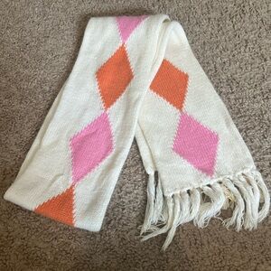Pink, orange, and white argyle scarf 45 inches (stain on one end)